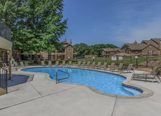 Pool With Sunning Deck at Waterford Place Apartments & Townhomes, Kansas
