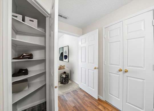 Hallway And Storage Area at The Claremont Apartment Homes, Overland Park, KS