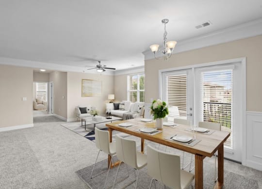a dining room and living room with a table and chairs