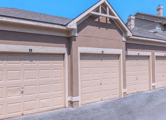 A row of detached garages at Stonepost Lakeside Apartment Homes in Olathe, Kansas.