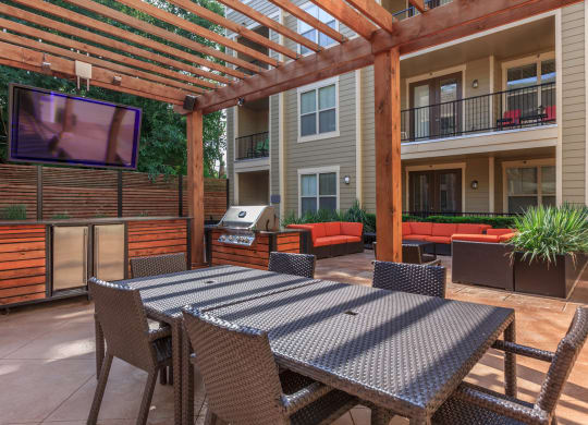 Outdoor seating chair and tableat West 39th Street Apartments, Missouri