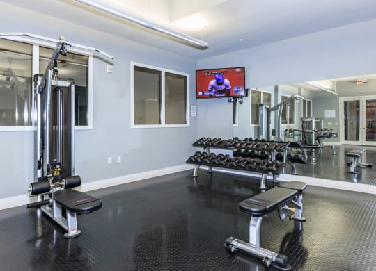 Bench press and weightsat West 39th Street Apartments, Kansas City, 64111
