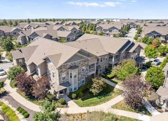an aerial view of a neighborhood of houses at Stonepost Crossing Apartments, Overland Park, KS, 66213