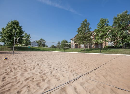 A sand volleyball court at Stonepost Ranch Apartment Homes in Overland Park, Kansas.