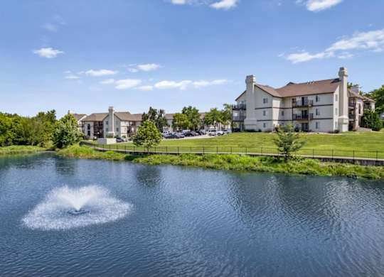 Lakefront apartment homes overlooking the community fountain and walking trail.