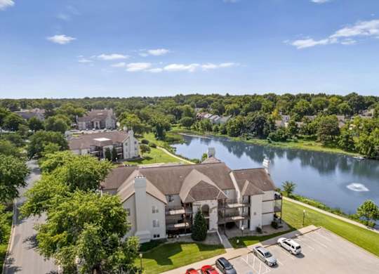 Residential building overlooking the community lake and walking trail.
