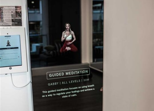 mirror fitness system in yoga room at Sky on Main in Missouri