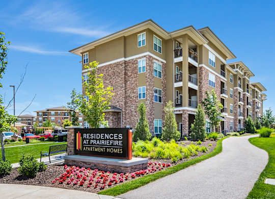 A sign in front of a building that says Residences at Prairiefire. at Residences at Prairiefire Apartment Homes, Overland Park, 66223