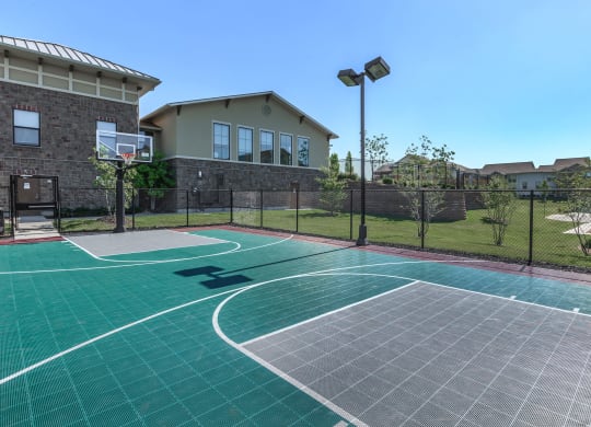 Basketball Court in Prairie Creek Apartments in Kansas  at Prairie Creek Apartments & Townhomes, Lenexa, 66219