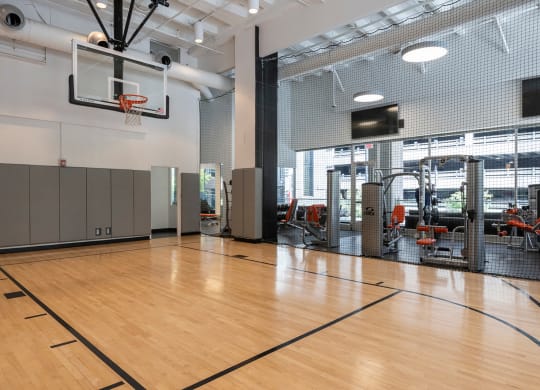 indoor basketball court in fitness center at Sky on Main Apartments in Kansas City, MO