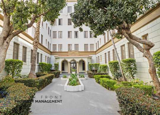 A building with a sign that says Front Management.