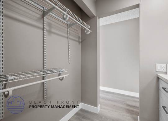 A laundry room with a washer and dryer.