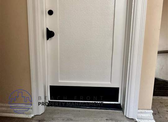A white door with the number 1091 on it.