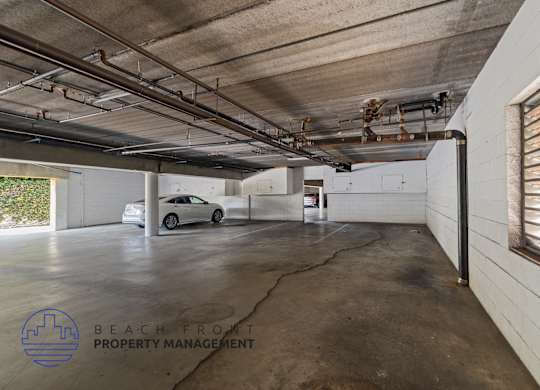 a parking garage with a car in it