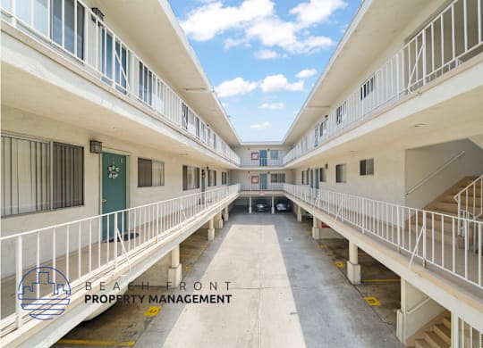 an empty corridor of an apartment building walkways and stairs