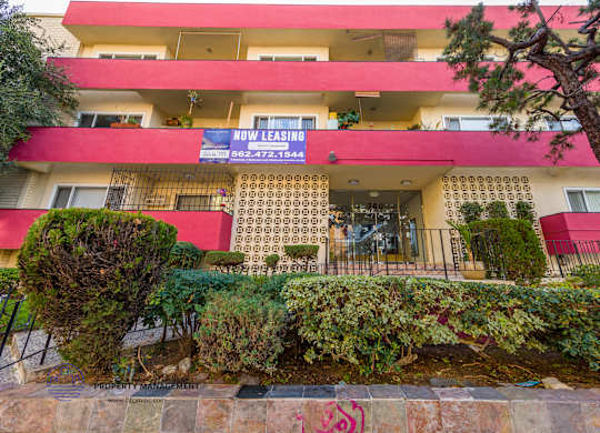 A red building with a sign that says