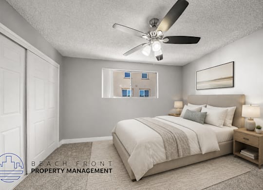 A bedroom with a bed, nightstand, and a ceiling fan.