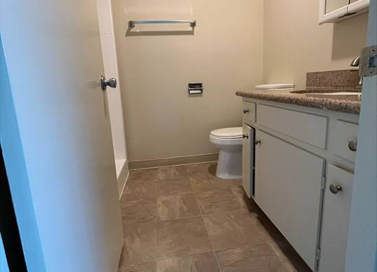 a small bathroom with a toilet and a sink