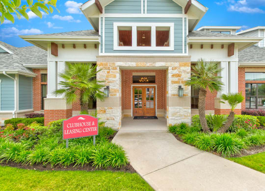 a house with a sign in front of it