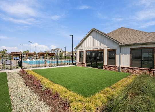 A house with a pool in the backyard.