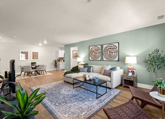 a living room with a couch and a table