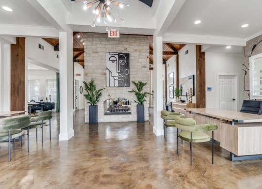 the preserve at ballantyne commons community room with bar and fireplace