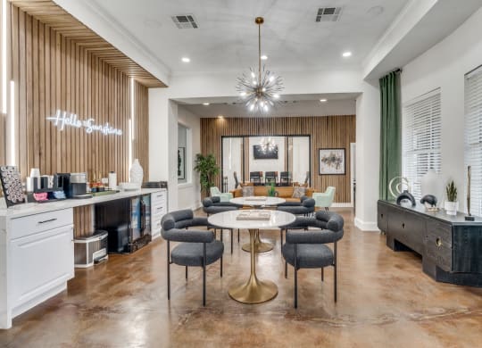 a dining room with a table and chairs and a living room