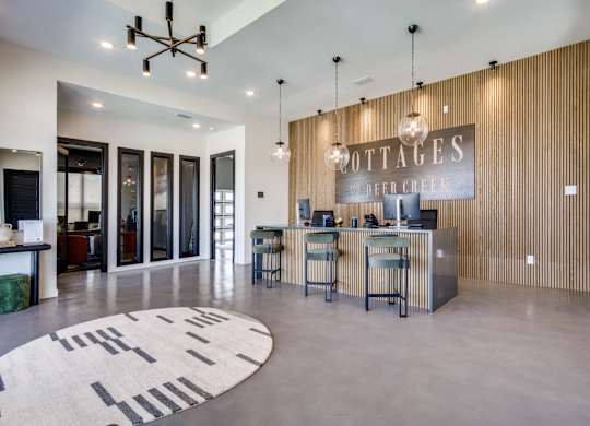A large room with a sign that says