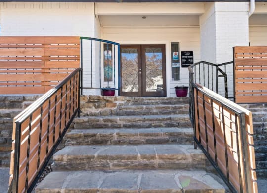 the stairs up to the entrance of a building