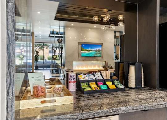 A reception desk with a sign that says
