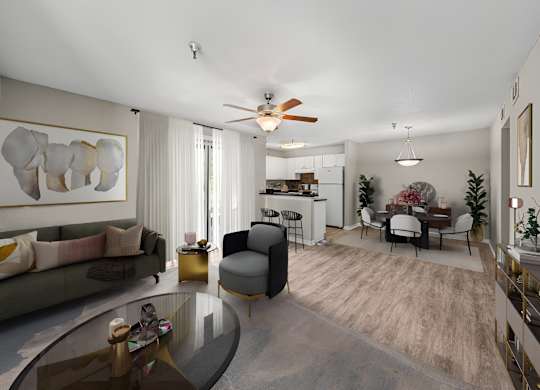 A modern living room with a glass coffee table and a grey sofa.