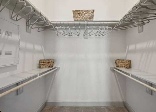 A white refrigerator with a basket on top of the door.