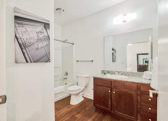 bathroom with a toilet sink and bathtub