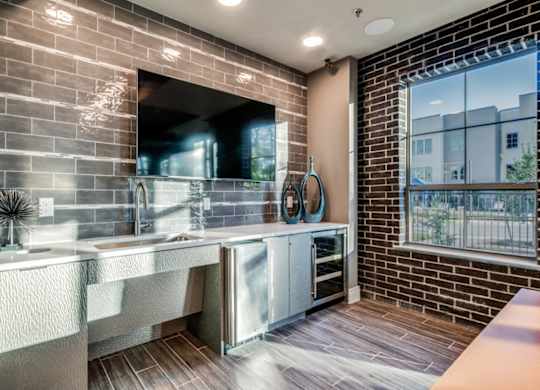 A bathroom with a double sink vanity and a large mirror.
