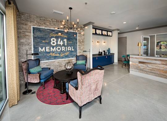 A room with a large sign that says 841 Memorial.