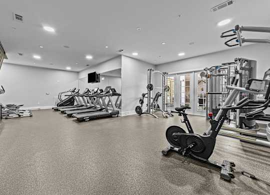 the gym has cardio machines and weights in it