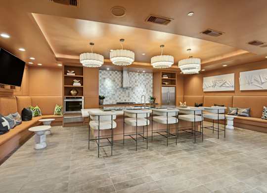 A modern dining room with a large table and chairs.
