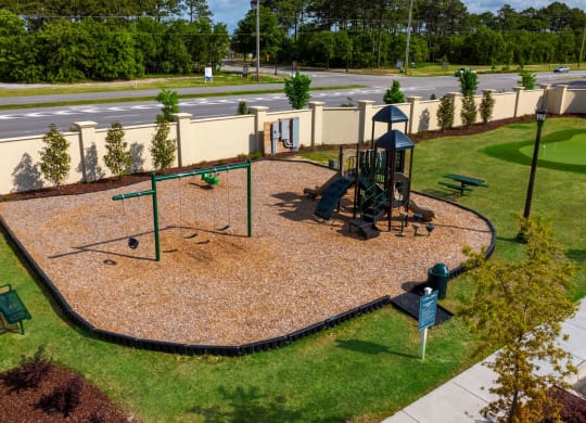 an aerial view of a playground in a park