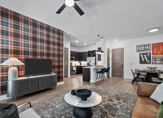 a living room with a couch and a tv