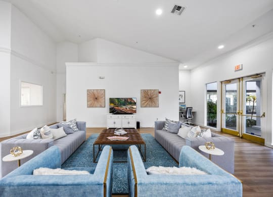 a living room with couches and a coffee table