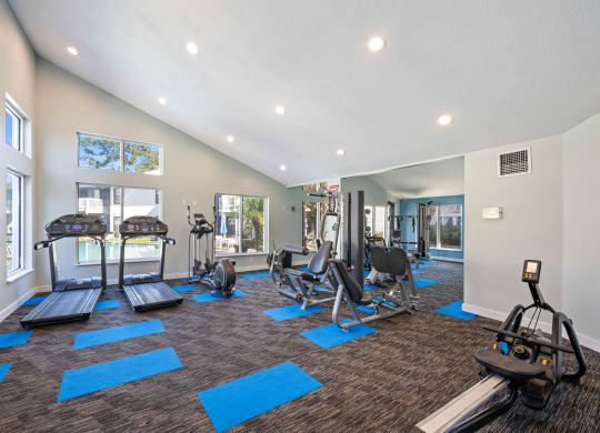 the preserve at ballantyne commons fitness room with exercise equipment and windows
