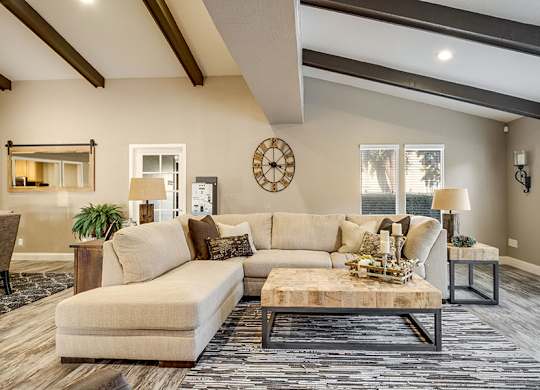 a living room with a couch and a coffee table