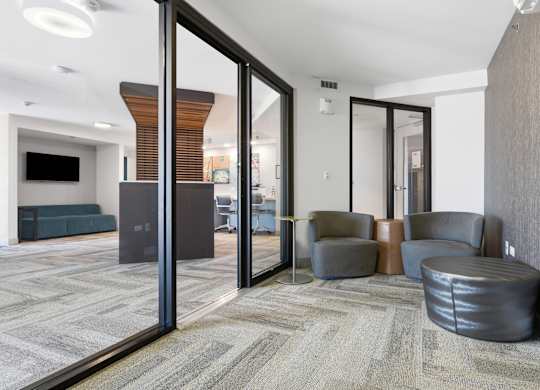 A conference room with assorted seating in the business center.