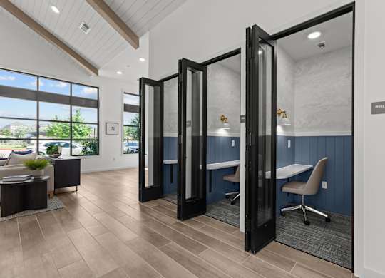 A room with a table and chairs in it.