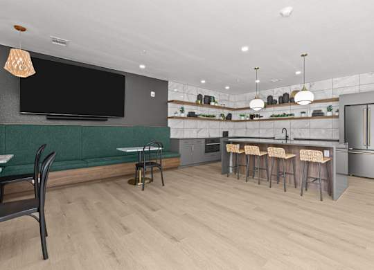 A modern kitchen with a bar area and a television.
