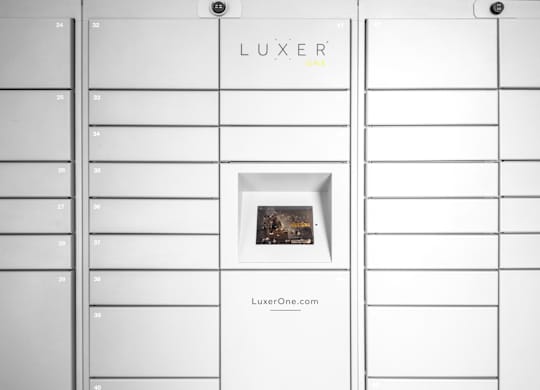 A white display board with the word LUXER on it.