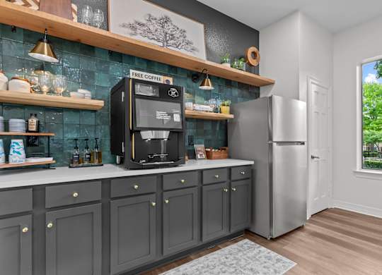 A kitchen with a coffee machine on the counter.