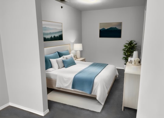 a bedroom with a white bed and blue pillows