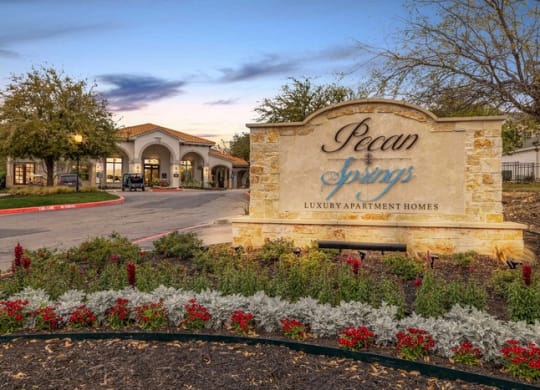the sign at the entrance of ocean springs legacy parkway homes