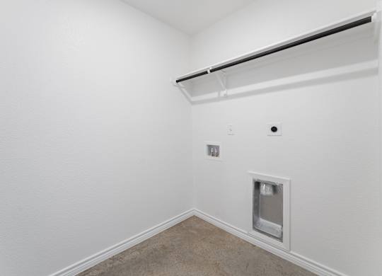 a white room with a white wall and a window and a door